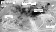 This satellite photo courtesy of the Department of Defense shows a battle damage assessment image of Shayrat Airfield, Syria,following US Tomahawk Land Attack Missile strikes on April 7, 2017 from the USS Ross (DDG 71) and USS Porter (DDG 78), Arleigh Bur