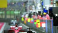 Mercedes' British driver Lewis Hamilton drives out of the pits during the qualifying session for the Formula One Chinese Grand Prix in Shanghai. 