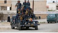 Iraqi forces take position as they advance towards Mosul’s Old City on April 8, 2017, during a military offensive to retake the western part of the city from Islamic State (IS) group fighters.<br />AHMAD GHARABLI / AFP
