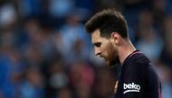 Barcelona's Argentinian forward Lionel Messi stands during the Spanish league football match Malaga CF vs FC Barcelona at La Rosaleda stadium in Malaga on April 8, 2017. / AFP / JORGE GUERRERO
