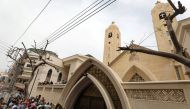 Egyptians gather in front of a Coptic church that was bombed on Sunday in Tanta, Egypt, April 9, 2017. REUTERS/Mohamed Abd El Ghany