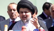 FILE PHOTO: Prominent Iraqi cleric Moqtada al-Sadr speaks during news conference in Najaf, south of Baghdad, March 22, 2016 (REUTERS / Alaa Al-Marjani) 