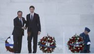 French President Francois Hollande (L) and Canadian Prime Minister Justin Trudeau shake hands as they attend a ceremony to commemorate the 100th anniversary of the Battle of Vimy Ridge at the Canadian National Memorial in Vimy, France, April 9, 2017. REUT