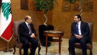 Lebanon's President Michel Aoun (L) meets with Prime Minister Saad al-Hariri at the Presidential Palace in Baabda, Lebanon April 12, 2017. Dalati Nohra/Handout via Reuters 