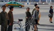 People cross the street in central Pyongyang, North Korea April 12, 2017. REUTERS/Damir Sagolj