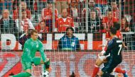 Real Madrid's Portuguese forward Cristiano Ronaldo (right) scores their second goal past Bayern Munich's goalkeeper Manuel Neuer during their UEFA Champions League 1st leg quarter-final football match in Munich, southern Germany yesterday.