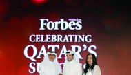 GWC officials receiving 'Qatar Success Award', at the St. Regis Hotel in Doha yesterday.
