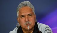 This file photo taken on July 8, 2016 shows Sahara Force India F1 team principal Vijay Mallya speaking during a press conference following the second practice session at Silverstone motor racing circuit in Silverstone, central England. AFP / Andrej Isakov