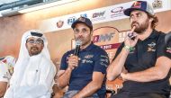 Toyota Hilux Overdrive racing's Qatari driver Nasser Saleh Al Attiyah (centre) speaks during a pre-event press conference yesterday.