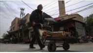 People living in Eastern Goutha are seen as they try live in hard conditions during civil war, in Damascus, Syria on April 18, 2017. ( Amer Almohibany - Anadolu Agency ).