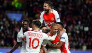 Monaco's Kylian Mbappe Lottin celebrates after scoring their first goal with team mates during their UEFA Champions League Quarter Final second leg match against Borussia Dortmund. 
