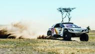 United Arab Emirates' Sheikh Khalid Al Qassimi on his way to claim a fine stage win in his Peugeot 3008 DKR during the Qatar Cross-Country Rally yesterday. 