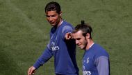 Real Madrid's Cristiano Ronaldo points out team mate Gareth Bale during training session. REUTERS/Sergio Perez
