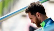 Barcelona's Argentinian forward Lionel Messi looks down as he arrives for a training session at the Sports Center FC Barcelona Joan Gamper in Sant Joan Despi, near Barcelona on April 22, 2017 on the eve of their Spanish League Clasico football match Real 