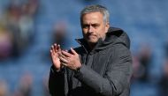 Manchester United's Portuguese manager Jose Mourinho applauds after the English Premier League football match between Burnley and Manchester United at Turf Moor in Burnley, north west England on April 23, 2017. AFP / OLI SCARFF 