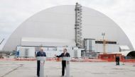 Presidents of Ukraine Petro Poroshenko (R) and Belarus Alexander Lukashenko attend a commemoration ceremony, which marks the anniversary of the nuclear disaster, near a New Safe Confinement (NSC) structure over the old sarcophagus covering the damaged fou