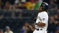 Apr 26, 2017; Pittsburgh, PA, USA; Pittsburgh Pirates second baseman Gift Ngoepe (61) reacts after recording his first major league hit against the Chicago Cubs during the fourth inning at PNC Park. Mandatory Credit: Charles LeClaire-USA TODAY Sports