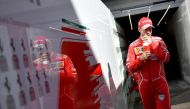 Ferrari's German driver Sebastian Vettel walks after the second practice session of the Formula One Russian Grand Prix at the Sochi Autodrom circuit in Sochi on April 28, 2017. / AFP / ANDREJ ISAKOVIC