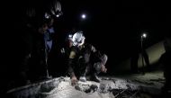 Civil defence members search for survivors under the rubble at a site hit by an airstrike in west of Idlib city, Syria April 28, 2017. REUTERS/Ammar Abdullah TPX IMAGES OF THE DAY
