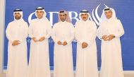 H E Sheikh Abdullah bin Saud Al Thani (second right) and Abdulaziz bin Nasser Al Khalifa (left) with top officials of the winning banks during Al Dhameen Program Best Partner Bank award ceremony yesterday. Pic: Baher Amin/ The Peninsula