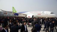 (FILES) This file photo taken on November 2, 2015 shows China's first big passenger plane, the C919, on display at a facility in commercial hub in Shanghai. AFP / STR 