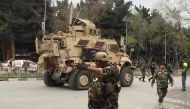 A damaged U.S. military vehicle is seen at the site of a suicide bomb attack in Kabul, Afghanistan May 3, 2017. REUTERS/Mirwais Harooni.