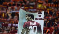 (file photo) AS Roma's supporters hold a banner showing Italy's captain Francesco Totti. April 30, 2017 at the Olympic Stadium in Rome. / AFP / FILIPPO MONTEFORTE
