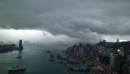 Clouds gather over the Hong Kong skyline on May 4, 2017. PHOTO: AFP.