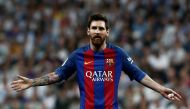 Lionel Messi of Barcelona gestures during the La Liga match between Real Madrid and Barcelona at Santiago Bernabeu Stadium in Madrid, Spain on April 23, 2017. Burak Akbulut - Anadolu Agency 