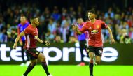 Manchester United's Marcus Rashford (right) celebrates after scoring their first goal against Celta Vigo during the UEFA Europa League semi- final first leg played at Balaidos Stadium in Vigo, Spain  on Thursday.
