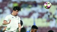 Al Sadd striker Baghdad Bounedjah heads home to score one of his four goals in their 4-1 win against Al Kharaitiyat in the Emir Cup quarter-final match at Lekhwiya Stadium.  
