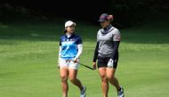 (L-R) Sisters Moriya Jutanugarn and Ariya Jutanugarn of Thailand walk towards the twelfth green during the second round of the Citibanamex Lorena Ochoa Match Play Presented by Aeromexico and Delta at Club De Golf Mexico on May 5, 2017 in Mexico City, Mexi