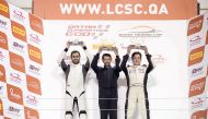 Abdullah Al Khelaifi, Mahmoud Al Khalaf and Saadon Al Kuwari, the podium winners at fifth round of the Qatar Touring Car Championship celebrate on the podium at the Losail International Circuit on Saturday.