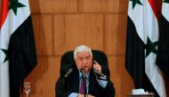 Syrian Foreign Minister Walid Muallem speaks during a press conference in the capital Damascus on May 8, 2017.   AFP / Louai Beshara
