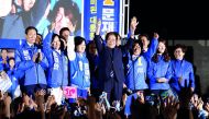 Moon Jae-in (centre), the presidential candidate of the Democratic Party of Korea, attends his election campaign rally in Seoul. 