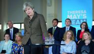 Britain's Prime Minister Theresa May addresses Conservative candidates for London and the southeast at the Dhamecha Lohana Centre in Harrow, northwest London, yesterday.