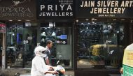 Jewellery is displayed for sale in shop windows in the Indian capital New Delhi on May 8, 2017. AFP / Money Sharma 