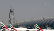 Emirates Airlines aircrafts are seen at Dubai International Airport, United Arab Emirates May 10, 2016. REUTERS/Ashraf Mohammad/File photo - RTX2FQ68/File Photo
