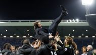 Chelsea manager Antonio Conte is thrown in the air by his players as they celebrate winning the Premier League title Action Images via Reuters / Carl Recine 
