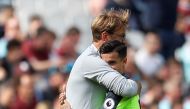 Liverpool manager Juergen Klopp and Liverpool's Philippe Coutinho after being substituted. Reuters / Peter Nicholls

