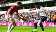 Tottenham Hotspur's striker Son (right) vies with Manchester United midfielder Michael Carrick during the English Premier League match at White Hart Lane in London