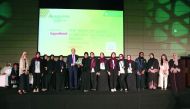 Senior officials of INJAZ Qatar and sponsoring companies posing for a group photo with the winners of the Mubadara 2017 Competition. 