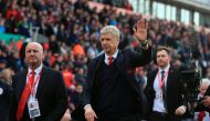 Arsenal's French manager Arsene Wenger (C) gestures as he leaves after the English Premier League football match between Stoke City and Arsenal at the Bet365 Stadium in Stoke-on-Trent, central England on May 13, 2017. Arsenal won the game 4-1. AFP / Linds