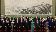 Chinese President Xi Jinping poses for a group photo with other delegates and guests at the welcoming banquet for the Belt and Road Forum in Beijing on May 14, 2017. China touted on Sunday its new Silk Road as 