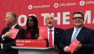 (L-R) Ian Lavery, Labour elections and campaign coordinator, Kate Osamor, Shadow minister for international developement, British opposition Labour party leader Jeremy Corbyn and deputy leader Tom Watson pose with copies of the Labour election manifesto a