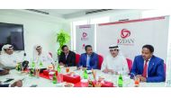 Sheikh Dr Khalid bin Thani bin Abdullah Al Thani ( second right), Chairman of Ezdan Holding Group; Ezdan's Vice-Chairman Sheikh Abdullah bin Thani Al Thani (second left), and Group CEO Ali Mohamed Al Obaidli (left) and dignitaries from Ethiopia at a meeti