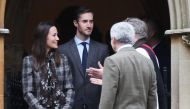 (FILES) This file photo taken on December 25, 2016 shows Pippa Middleton (L) and James Matthews departing after attending a Christmas Day service at St Mark's Church in Englefield. AFP / POOL / Andrew Matthews
