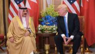 US President Donald Trump (R) and Bahrain's King HM Hamad bin Isa Al Khalifa take part in a bilateral meeting at a hotel in Riyadh on May 21, 2017. AFP / Mandel NGAN
