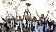 Juventus’ Gianluigi Buffon lifts the trophy as the Juventus players and staff celebrate winning the leagueReuters / Giorgio Perottino
