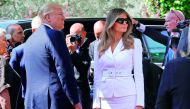 US President Donald Trump and US First Lady Melania Trump arrive at the Israeli President's Residence in Jerusalem, yesterday. Melania Trump (seated right) talk to children during a visit to the Hadassah Ein Kerem hospital in Jerusalem, yesterday.